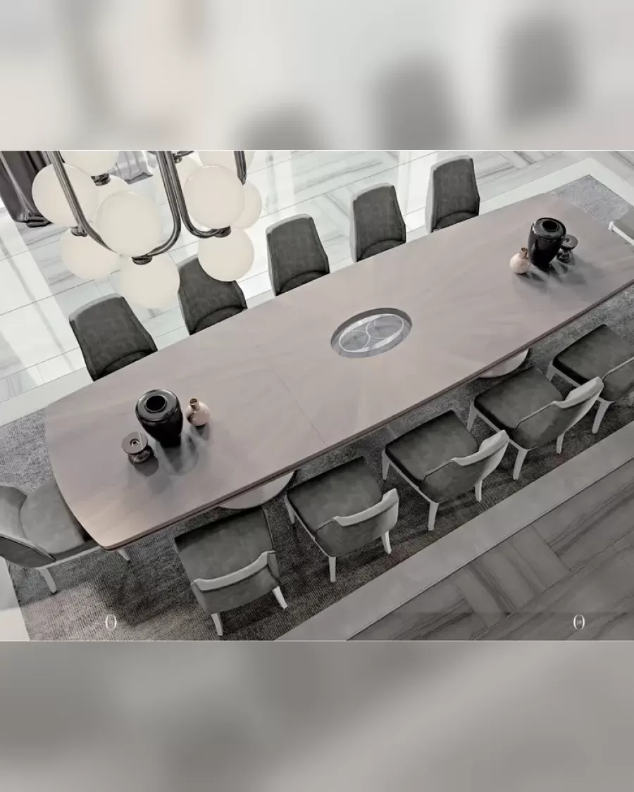 Tavolo da pranzo Ellipse da cinque metri di Francesco Pasi, tavolo da pranzo rivolto verso una credenza