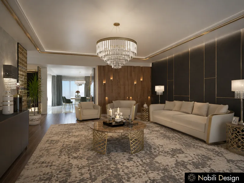 Modern living room with cream sofa, dark wall panels with brass strips and a tiered crystal chandelier