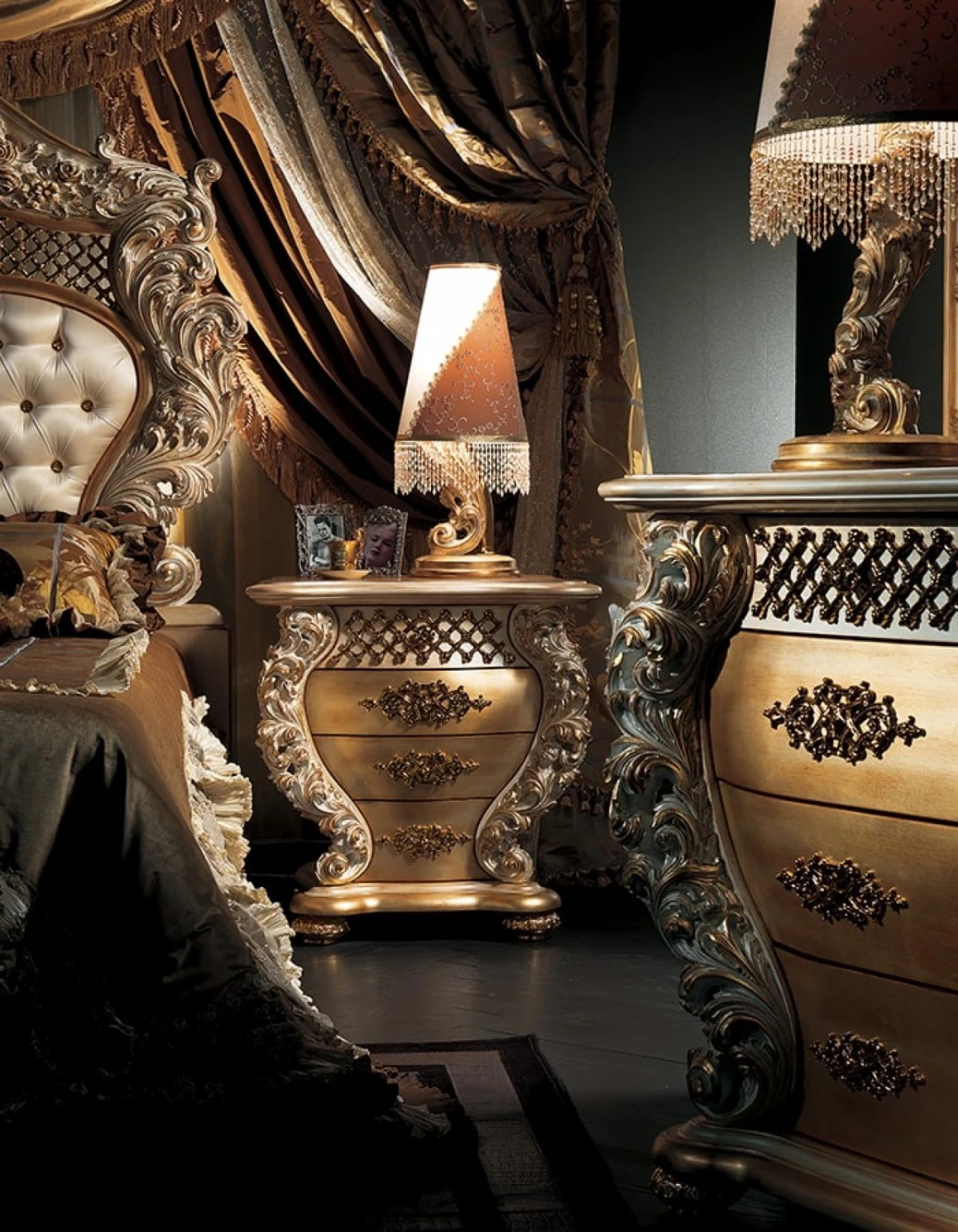 Gilded carved nightstand and chest of drawers beside a capitonné bed, high end Italian furniture in London