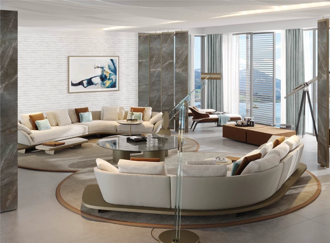Two curved cream sofas facing each other around a round table, imported Italian furniture