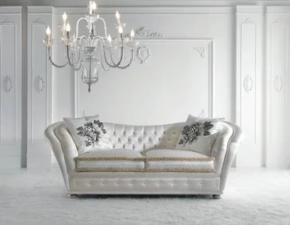 Classic Italian sofa from the Epoque Home Philosophy collection featuring fine fabrics and refined details.