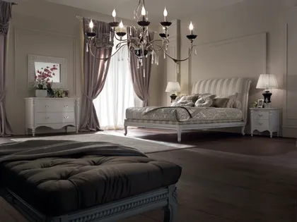 Elegant Epoque Home Philosophy living room furniture with golden metal accents and premium Italian upholstery.